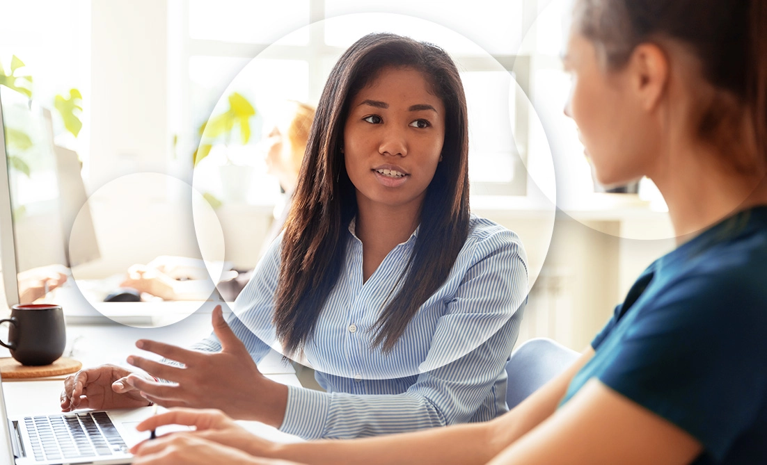 Young African American teacher working with middle school kids